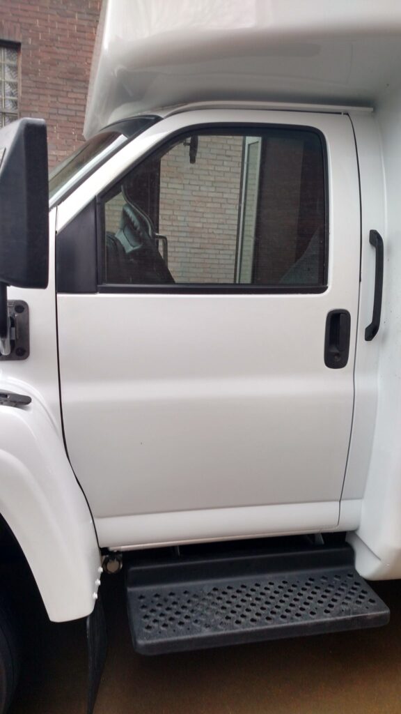 22 Passenger Titanium - Driver's Side